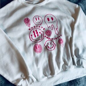 White “Radiate Positivity” Drippy Smiley Sweatshirt – Size Medium – Trendy Graph